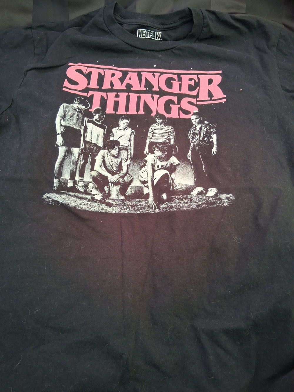 Netflix Stranger Things Black Tee with Pink Graphic